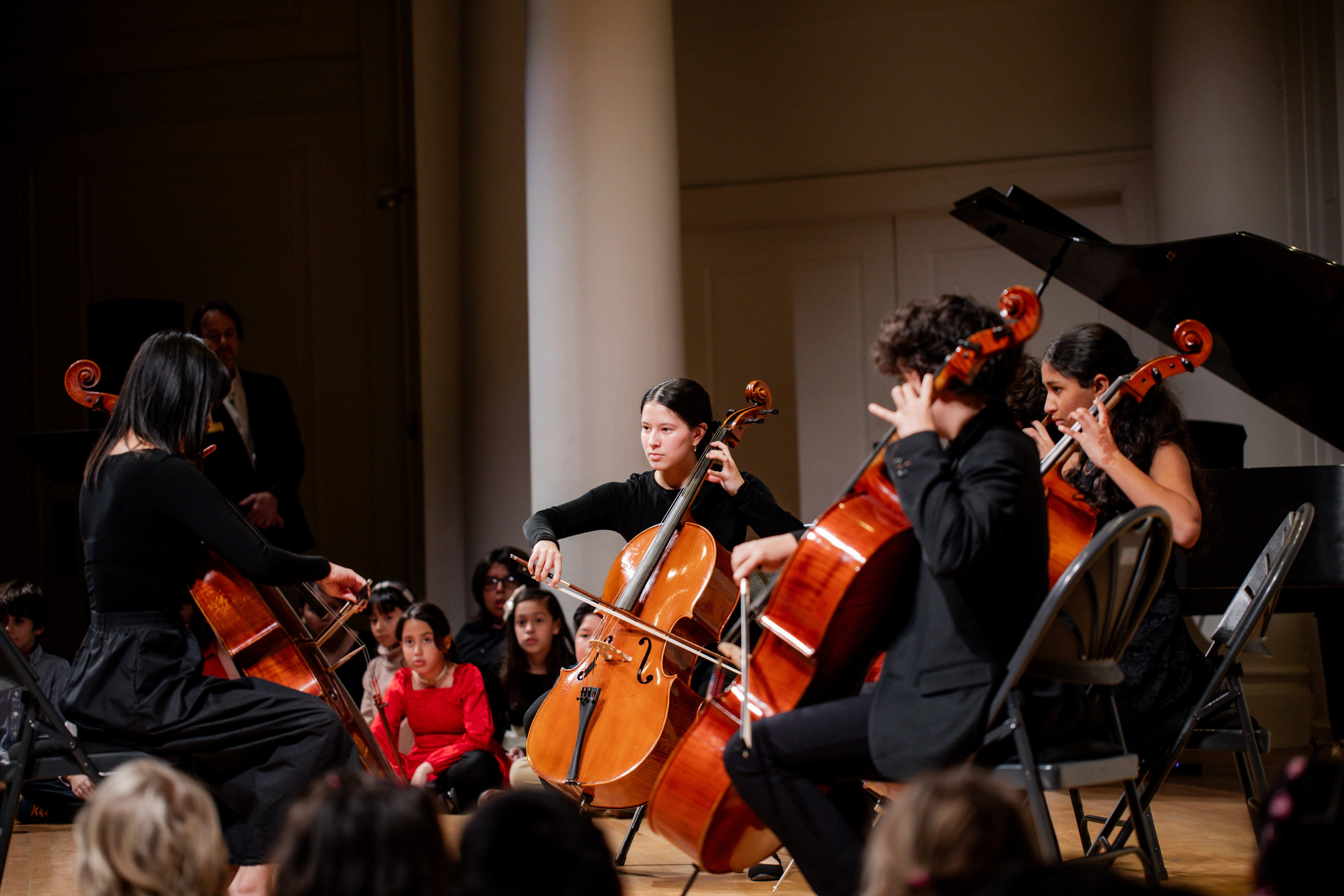 Suzuki cellists at Nichols Concert Hall, photo by Layne Dixon.